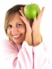 Wall Mural - Woman in housecoat with apple