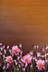 Sticker - Wildflowers on wooden background