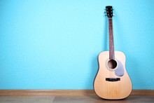 Classical Guitar On Blue Wallpaper Background