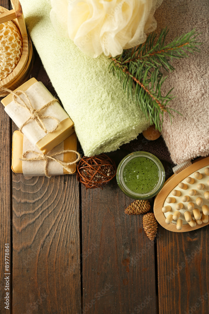 Spa treatments with pine extract on wooden background
