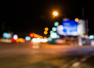 Wall Mural - image of blur street  bokeh background with warm colorful lights