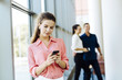 © NDABCREATIVITY - Beautiful women using phones and talkin during break