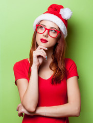 Wall Mural -  surprised women in christmas hat