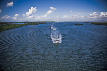 Wall Mural - Two motor boats navigating