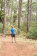 © WavebreakMediaMicro - Young happy jogger standing