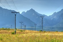 Summer Mountain Landscape. Beautiful View On The Electric Poles And High Tatra Mountains, Slovakia.