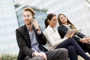 Wall Mural - Young business people outdoors