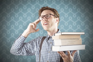 Sticker - Composite image of geeky student holding a pile of books