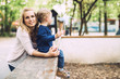 © NDABCREATIVITY - Mother having a good time with her son