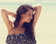 Happy beautiful closed eyes woman relaxing with epilation armpit