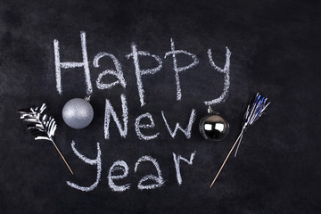 black board and an inscription happy new year