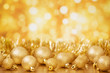 Christmas scene with gold baubles, gold background
