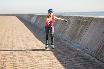 Wall Mural - Carefree sporty blonde skating