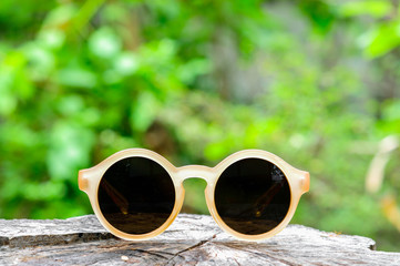 retro sunglasses on wooden