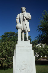 Wall Mural - This shows a statue of Christopher Columbus, in an outdoor, public area. It is situated on a pedestal commemorating 500 years since his discovery of America.