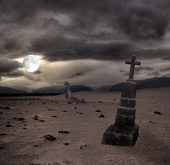 Wall Mural - Spooky Halloween graveyard with dark clouds