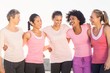 © WavebreakmediaMicro - Laughing women wearing pink for breast cancer