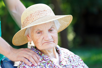 Canvas Print - Worried senior woman