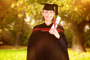 Canvas Print - Composite image of happy attractive graduate