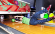 © Marino Bocelli - young man sliding down a bowling alley