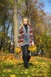 © Andrey_Arkusha - Happy Beautiful blonde woman walks in autumn park