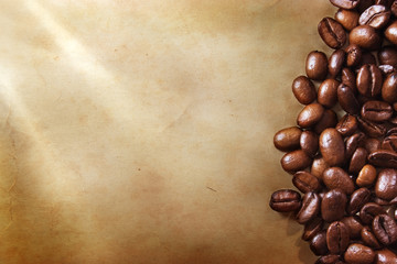 Coffee beans on grunge paper background