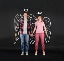 Funny Young Couple As Angels , On Black Background