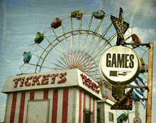 Aged And Worn Vintage Photo Of Retro Carnival With Games Sign