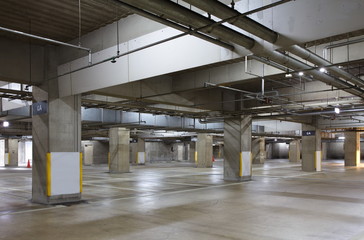 Empty space car park interior at night