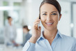 © stokkete - Smiling business woman on the phone