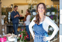 Portrait Of Smiling Female Owner At Flower Shop