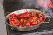Roasting red peppers on a outdoor grill