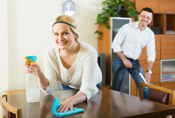 Wall Mural - Spouses dusting and hoovering