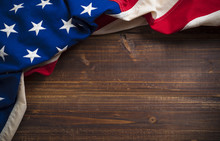 Old American Flag On Wooden Plank Background