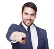 Smiling business man pointing the finger to the camera, isolated