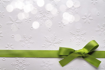 Wall Mural - Green ribbon bow with bokeh