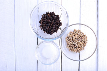 Sticker - Pepper and salt in bowl on white background