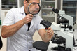 © milkovasa - Man working with a microscope in Laboratory