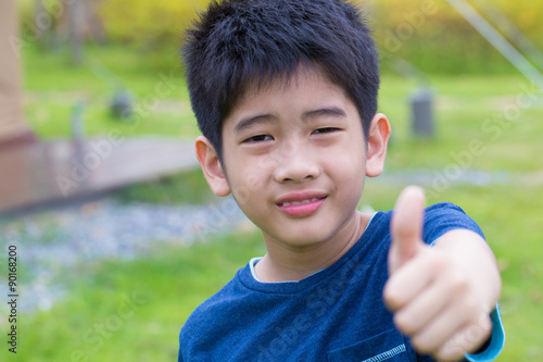 Asian Young Boy A Cute Asian Thai Young Boy With Thumb Up Asian Young Boy A Cute Asian Thai Young Boy With Thumb Up