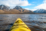 Fototapeta  - Kayaking on the sea in Svalbard, first person view