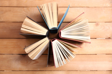 Poster - Heart of books, on wooden background