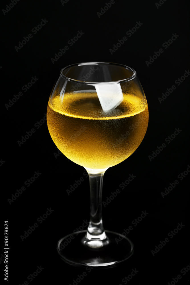 Glass of wine on dark background