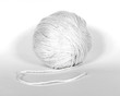 A ball of white wool yarn