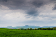 Green Field And Storm