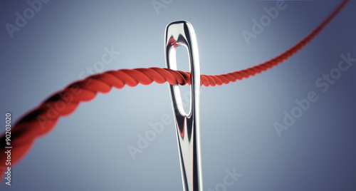 Foto  Nadel mit rotem Faden 2