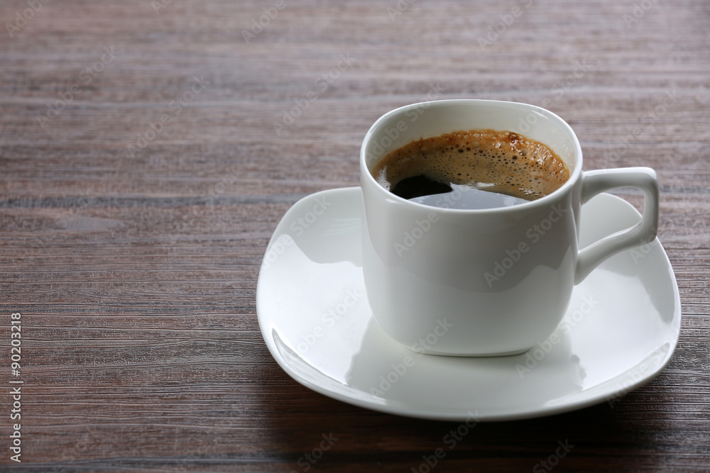 Cup of coffee on table close up