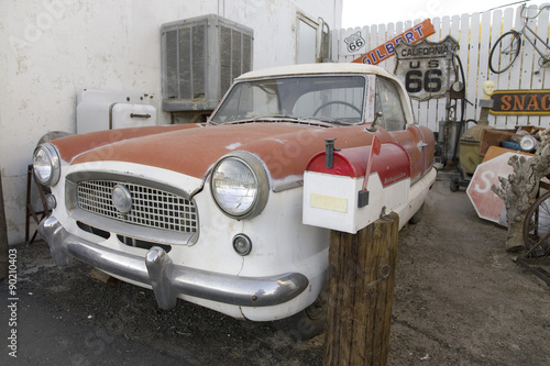 Obraz w ramie 1950's red and white Nash parked in front of Route 66 Motel, Barstow, California