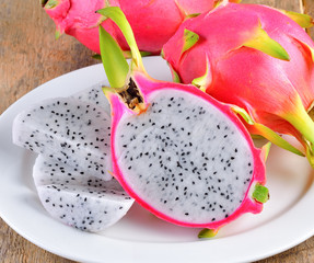 Wall Mural - dragonfruit on wooden background