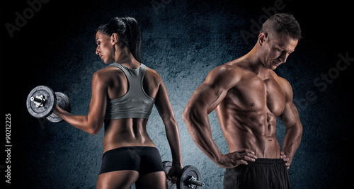 Tela Athletic man and woman with a dumbells.