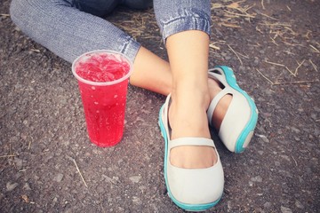 Wall Mural - Woman and strawberry drink with shoes